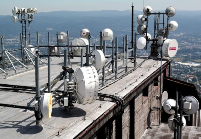 A roof with multiple receiver dishes