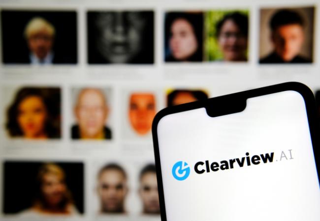 Clearview AI logo with facial images in the background