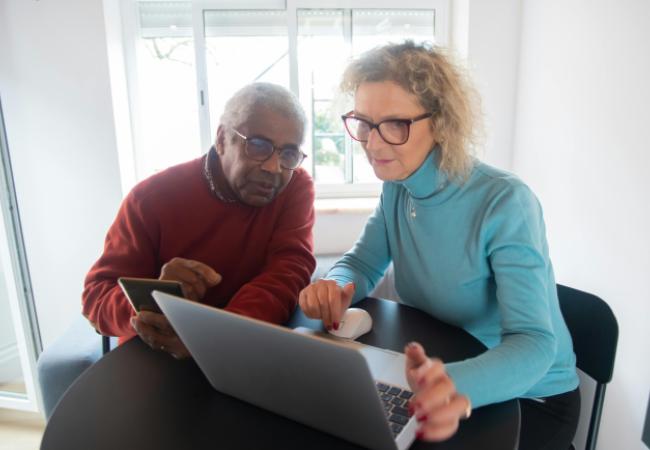 Elderly person with caregiver