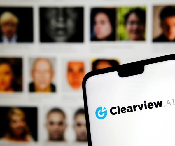 Clearview AI logo with facial images in the background