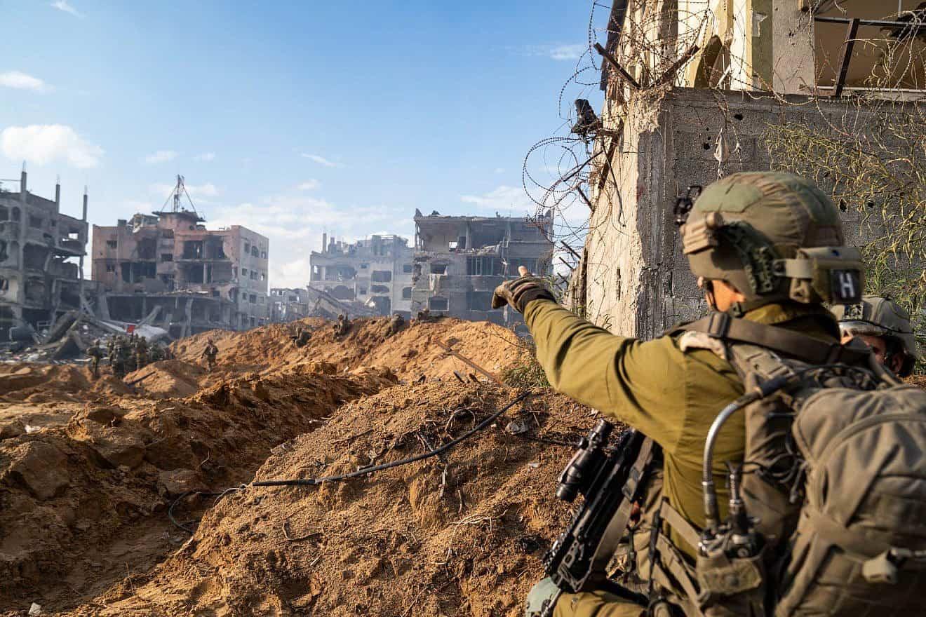 IDF soldier pointing in Gaza IDF photo
